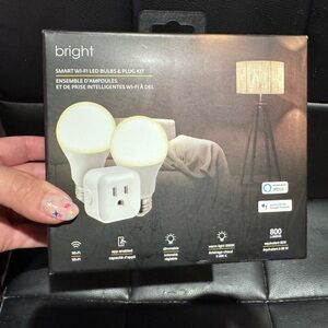 New in box, bright Smart Wi-Fi, LED bulbs and plug kit